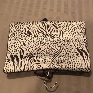 Gold and brown animal print lingerie travel bag